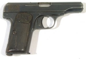 Pistola BROWNING, modelo 1910, calibre 9 corto, nº 156392-0