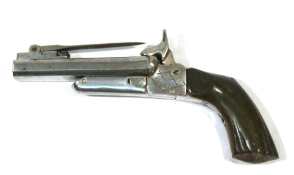 Pistola original SIN MARCA, modelo 2 cañones con bayoneta de 7 cm. calibre 10,5 mm, nº 39.-3489